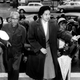 In this Feb. 24, 1956, file photo, Rosa Parks arrives at circuit court to be arraigned in the racial bus boycott in Montgomery, Ala.